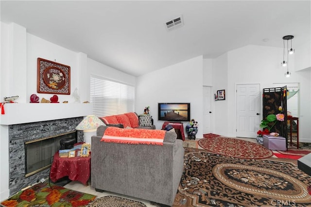 13035 Troy Ct, Victorville, CA 92395 - living room featuring vaulted ceiling and a high end fireplace