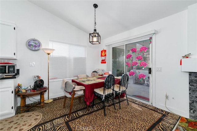 13035 Troy Ct, Victorville, CA 92395 - dining area with vaulted ceiling and baseboards
