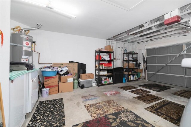 13035 Troy Ct, Victorville, CA 92395 - garage featuring water heater and a garage door opener