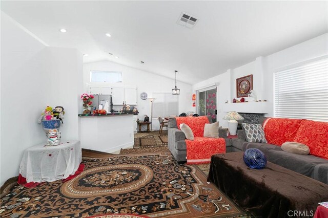 13035 Troy Ct, Victorville, CA 92395 - living area with vaulted ceiling and a fireplace