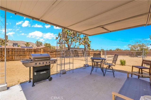 56565 Antelope Trl, Yucca Valley, CA 92284 - fenced backyard with a patio area and grilling area