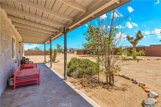 56565 Antelope Trl, Yucca Valley, CA 92284 - fenced backyard with a patio