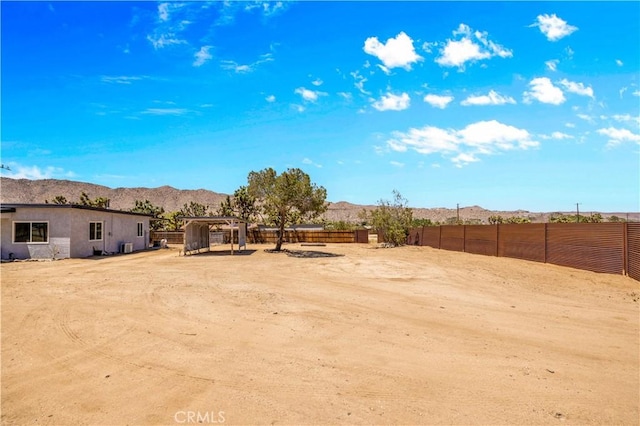 56565 Antelope Trl, Yucca Valley, CA 92284 - fenced backyard featuring a mountain view