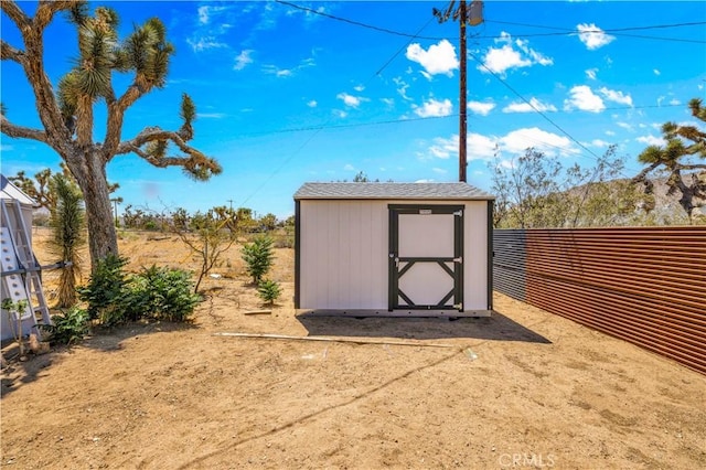 56565 Antelope Trl, Yucca Valley, CA 92284 - view of shed with a fenced backyard