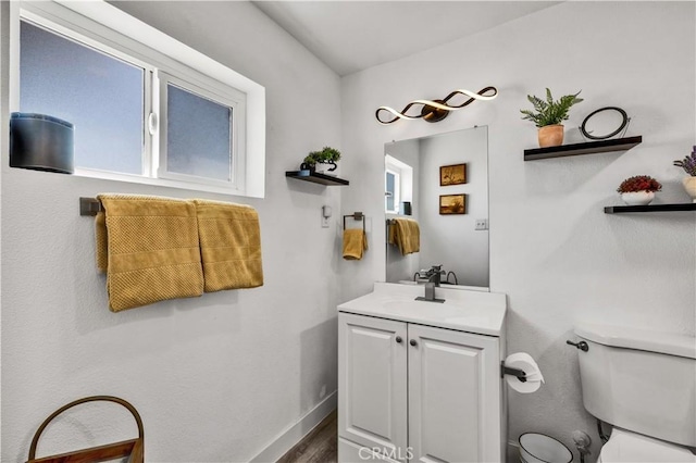 56565 Antelope Trl, Yucca Valley, CA 92284 - half bath featuring vanity and wood finished floors