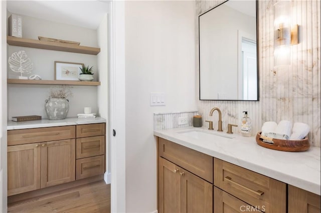 25652 Cervantes Ln, Mission Viejo, CA 92691 - bathroom with vanity, wood finished floors, and tasteful backsplash