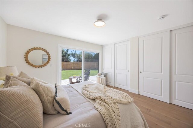 25652 Cervantes Ln, Mission Viejo, CA 92691 - bedroom featuring access to exterior and light wood-type flooring