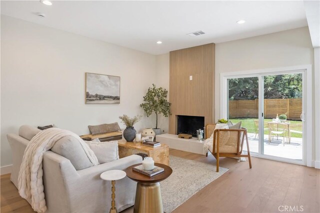 25652 Cervantes Ln, Mission Viejo, CA 92691 - living room with light wood-style flooring and recessed lighting