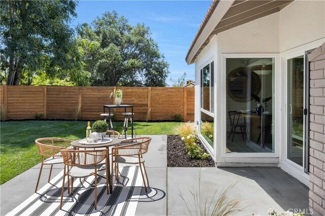 25652 Cervantes Ln, Mission Viejo, CA 92691 - fenced backyard with a patio area and outdoor dining area