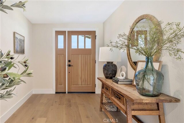 25652 Cervantes Ln, Mission Viejo, CA 92691 - foyer entrance with light wood finished floors and baseboards