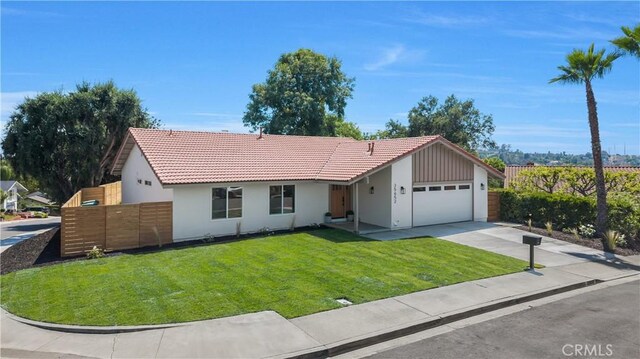 25652 Cervantes Ln, Mission Viejo, CA 92691 - ranch-style home featuring a garage, concrete driveway, a tile roof, and stucco siding