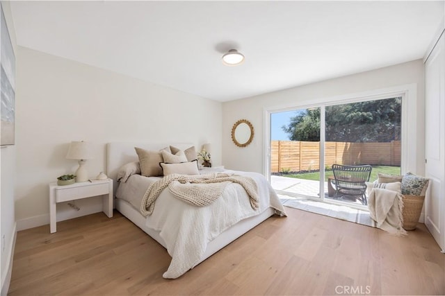 25652 Cervantes Ln, Mission Viejo, CA 92691 - bedroom with access to exterior and light wood-type flooring