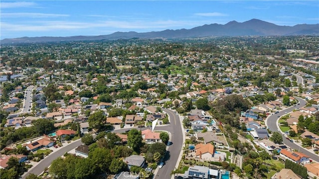 25652 Cervantes Ln, Mission Viejo, CA 92691 - aerial view of property and surrounding area featuring mountains and nearby suburban area