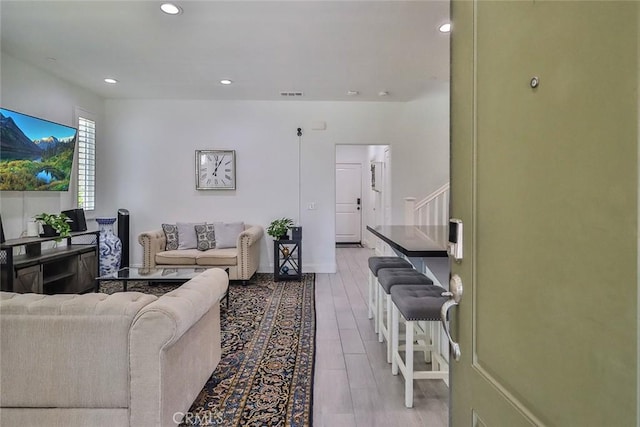 2928 Royal Ave, Simi Valley, CA 93065 - living room with recessed lighting, stairway, and light wood finished floors