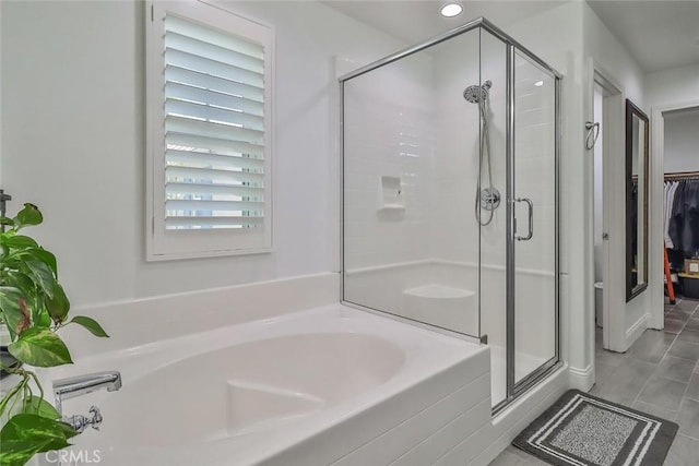 2928 Royal Ave, Simi Valley, CA 93065 - full bath featuring a stall shower, a garden tub, recessed lighting, a spacious closet, and tile patterned flooring
