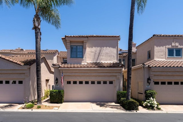 3647 Paseo Vista Famosa, Rancho Santa Fe, CA 92091 - mediterranean / spanish-style house with stucco siding, a tile roof, and an attached garage