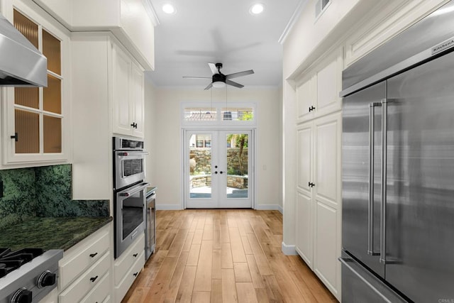 3647 Paseo Vista Famosa, Rancho Santa Fe, CA 92091 - kitchen featuring appliances with stainless steel finishes, a ceiling fan, wall chimney exhaust hood, recessed lighting, and light wood-style floors