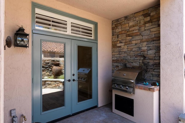 3647 Paseo Vista Famosa, Rancho Santa Fe, CA 92091 - entrance to property featuring french doors, stone siding, and stucco siding