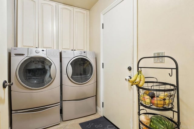 26267 Bellemore Dr, Ramona, CA 92065 - laundry room with washer and clothes dryer, cabinet space, and light tile patterned floors