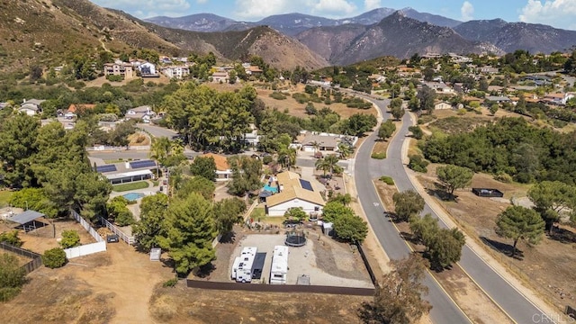 26267 Bellemore Dr, Ramona, CA 92065 - aerial overview of property's location with a mountainous background and nearby suburban area
