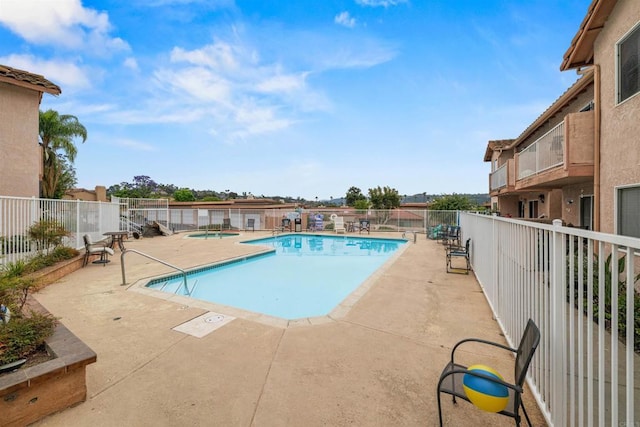 31916 Del Cielo Este Unit 38, Bonsall, CA 92003 - community pool featuring a patio area