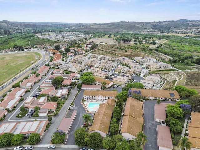 31916 Del Cielo Este Unit 38, Bonsall, CA 92003 - aerial view of property and surrounding area with nearby suburban area and a mountain backdrop