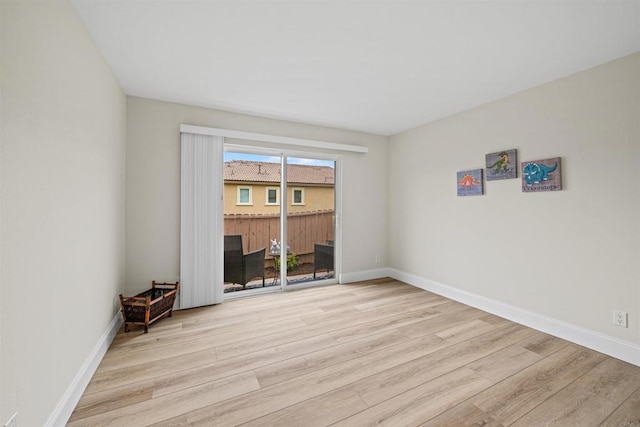 31916 Del Cielo Este Unit 38, Bonsall, CA 92003 - unfurnished room with wood finished floors and baseboards