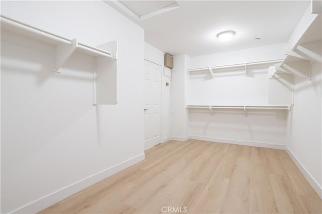 14114 Almetz Cir, Sylmar, CA 91342 - spacious closet with wood finished floors