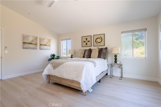 14114 Almetz Cir, Sylmar, CA 91342 - bedroom featuring multiple windows, light wood-style floors, and lofted ceiling