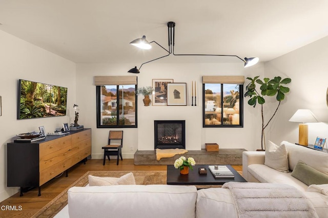 705 Alomar St, Ojai, CA 93023 - living area featuring wood finished floors and a lit fireplace