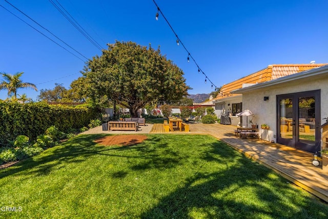 705 Alomar St, Ojai, CA 93023 - fenced backyard with a deck, french doors, and an outdoor hangout area