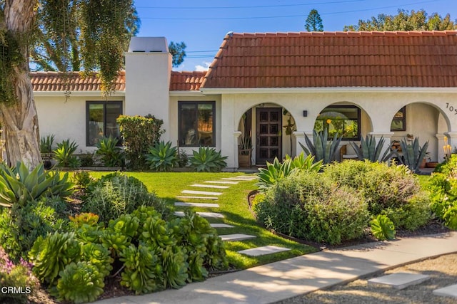 705 Alomar St, Ojai, CA 93023 - back of house featuring a tiled roof and stucco siding