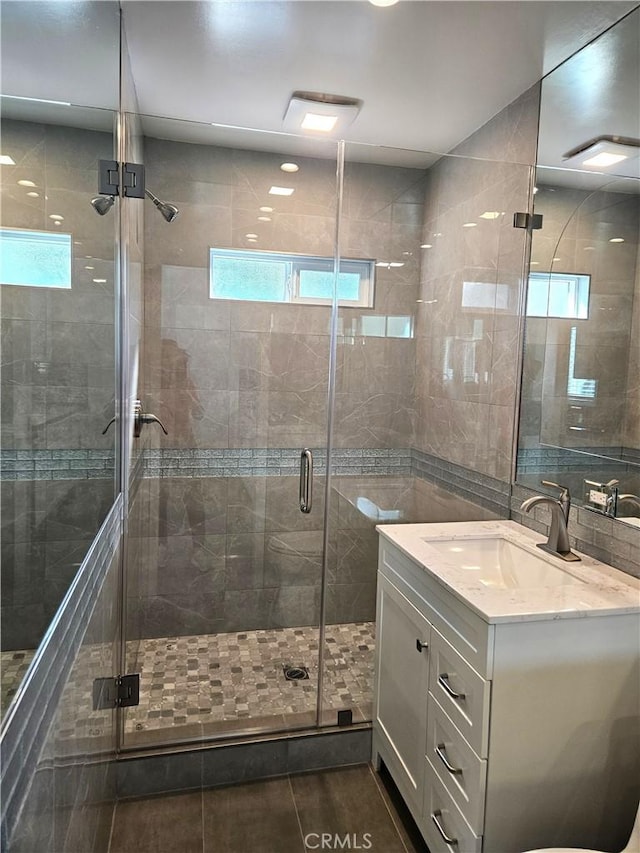 2774 Sawtelle Blvd, Los Angeles, CA 90064 - bathroom featuring vanity, healthy amount of natural light, and a stall shower