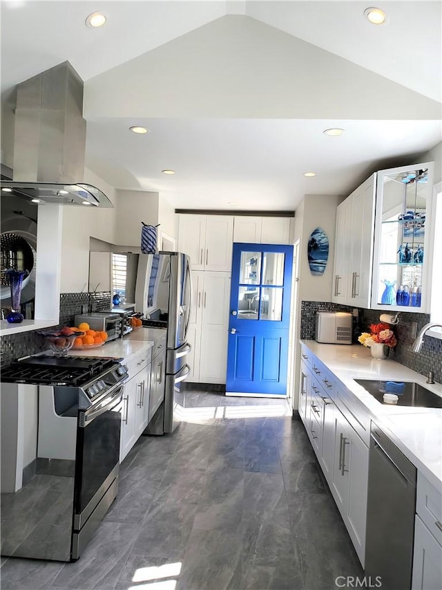2774 Sawtelle Blvd, Los Angeles, CA 90064 - kitchen with island range hood, appliances with stainless steel finishes, backsplash, recessed lighting, and light countertops
