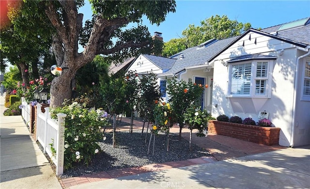 2774 Sawtelle Blvd, Los Angeles, CA 90064 - view of front facade with roof with shingles and stucco siding