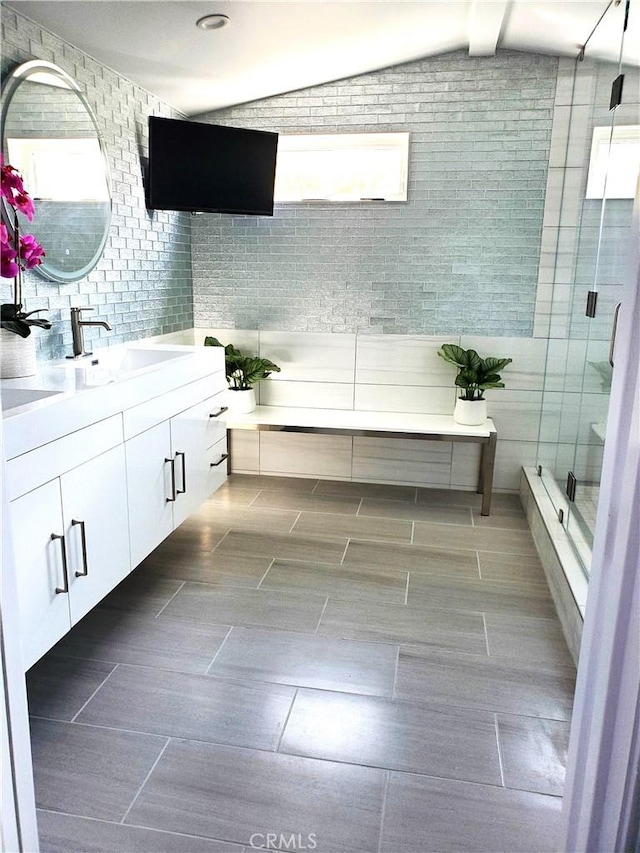 2774 Sawtelle Blvd, Los Angeles, CA 90064 - bathroom featuring vanity, lofted ceiling, and a stall shower