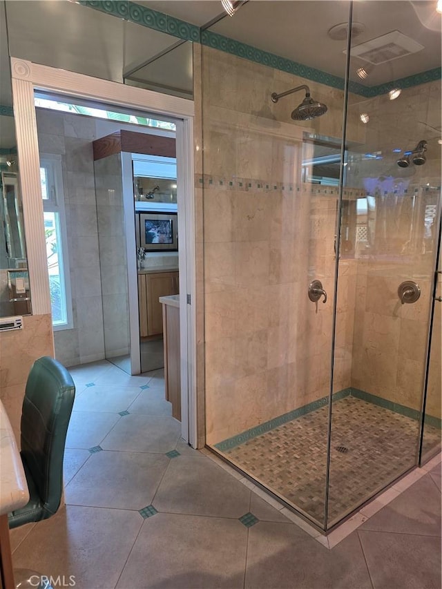 2774 Sawtelle Blvd, Los Angeles, CA 90064 - full bathroom featuring a shower stall and tile patterned floors