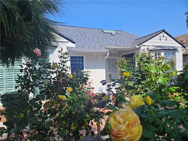 2774 Sawtelle Blvd, Los Angeles, CA 90064 - view of property exterior with a shingled roof and stucco siding