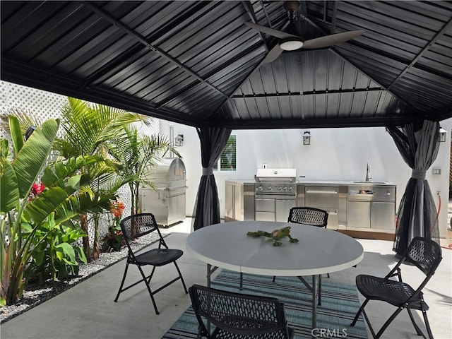 2774 Sawtelle Blvd, Los Angeles, CA 90064 - view of patio featuring a gazebo, an outdoor kitchen, outdoor dining area, and ceiling fan