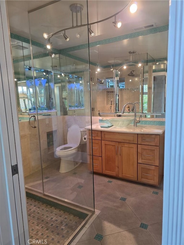 2774 Sawtelle Blvd, Los Angeles, CA 90064 - full bath with tile patterned floors, vanity, and a stall shower