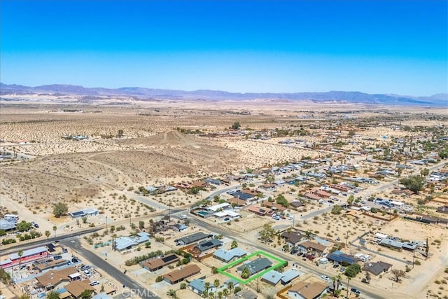 5982 Morongo Rd Unit 29, Palms, CA 92277 - aerial view of property and surrounding area featuring a mountain backdrop and a desert landscape