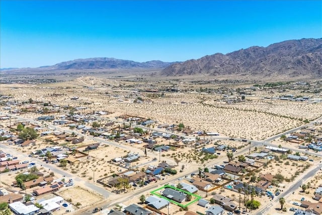 5982 Morongo Rd Unit 29, Palms, CA 92277 - drone / aerial view of a mountainous background and a desert landscape