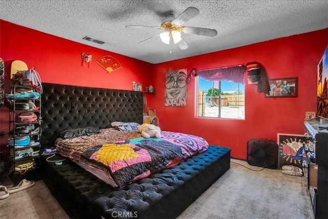 5982 Morongo Rd Unit 29, Palms, CA 92277 - bedroom with carpet flooring, a textured ceiling, and a ceiling fan