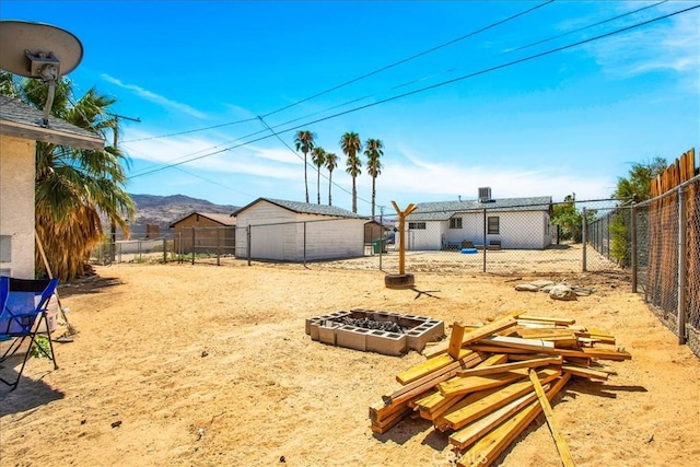 5982 Morongo Rd Unit 29, Palms, CA 92277 - fenced backyard featuring a mountain view
