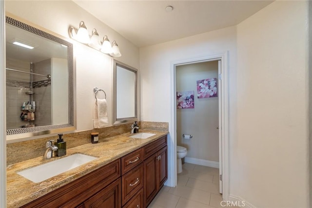 7019 Passons Blvd, Pico Rivera, CA 90660 - full bathroom featuring double vanity, tile patterned floors, and a tile shower