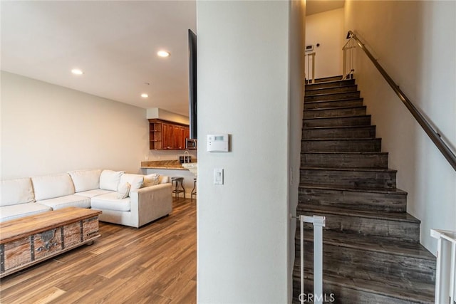 7019 Passons Blvd, Pico Rivera, CA 90660 - staircase featuring recessed lighting and wood finished floors