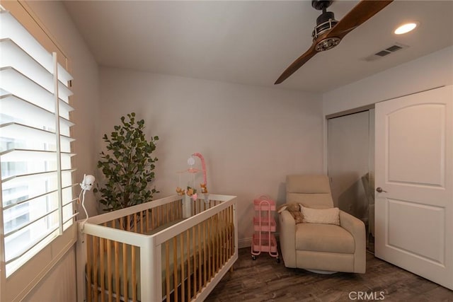 7019 Passons Blvd, Pico Rivera, CA 90660 - bedroom with wood finished floors, ceiling fan, a nursery area, and recessed lighting