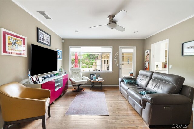 14060 Chandler Blvd, Sherman Oaks, CA 91401 - living area featuring crown molding, a ceiling fan, and wood finished floors