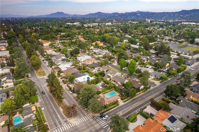 14060 Chandler Blvd, Sherman Oaks, CA 91401 - aerial perspective of suburban area with a mountainous background and a pool area