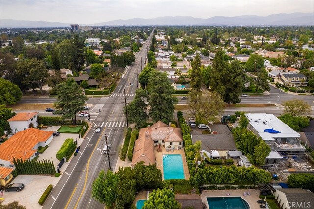 14060 Chandler Blvd, Sherman Oaks, CA 91401 - aerial perspective of suburban area with a pool and a mountainous background